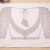 Back neck Aari blouse tracing design with tassels pattern