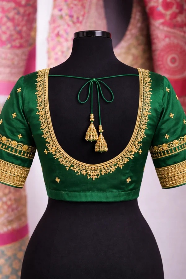 Aari blouse back design with deep neck and tassels