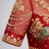 Aari work blouse sleeve design with pearl chain detailing