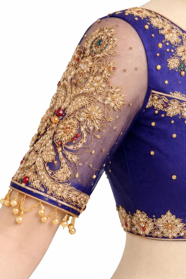 Handcrafted Aari work blouse detailing close-up