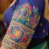 Aari blouse sleeve design peacock and paisley embroidery detail