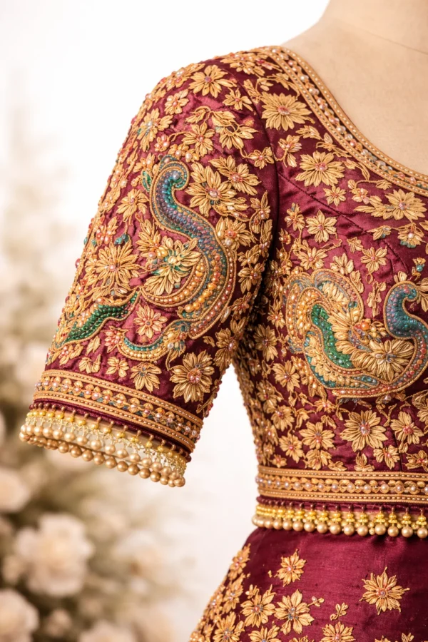 Aari embroidery sleeve design with peacock motif