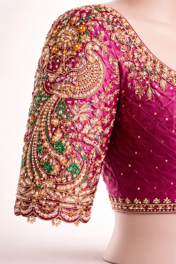 Peacock sleeve design with Aari embroidery and stone work