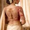Bridal blouse with saree net design with Aari work and tassels