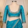 Luxury teal blue bridal Aari work blouse front view with heavy Maggam embroidery