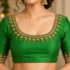 Luxury Emerald Green Bridal Aari Design Blouse front view with pearl and gold Maggam Work