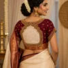 Cream panel bridal Aari embroidery blouse back design with handcrafted Maggam work