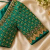 Designer bridal blouse sleeve with fish scale Aari embroidery and zardosi border