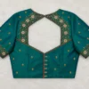Heavy bridal back neck Aari blouse with handcrafted Maggam work