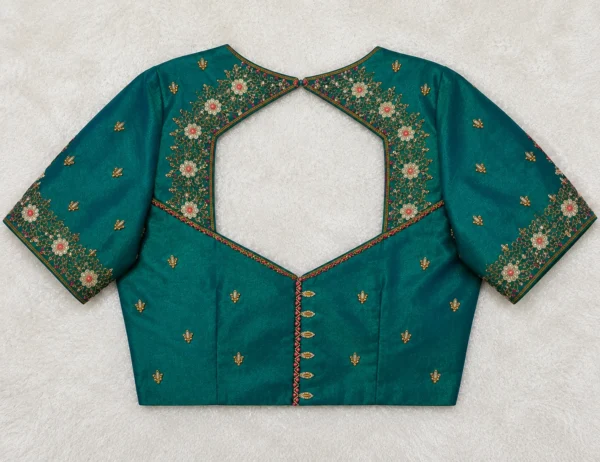 Heavy bridal back neck Aari blouse with handcrafted Maggam work