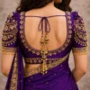 Back neck bridal Aari blouse with floral embroidery and pearl hanging tassels
