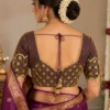 Deep V back Bridal Aari Blouse featuring geometric embroidery and hanging tassel detailing