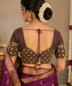 Deep V back Bridal Aari Blouse featuring geometric embroidery and hanging tassel detailing