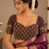 Luxury Bridal Aari Blouse Design with geometric Maggam Work embroidery and scalloped sleeves