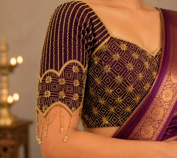 Designer scalloped sleeve with floral Aari embroidery and hanging bead chain work