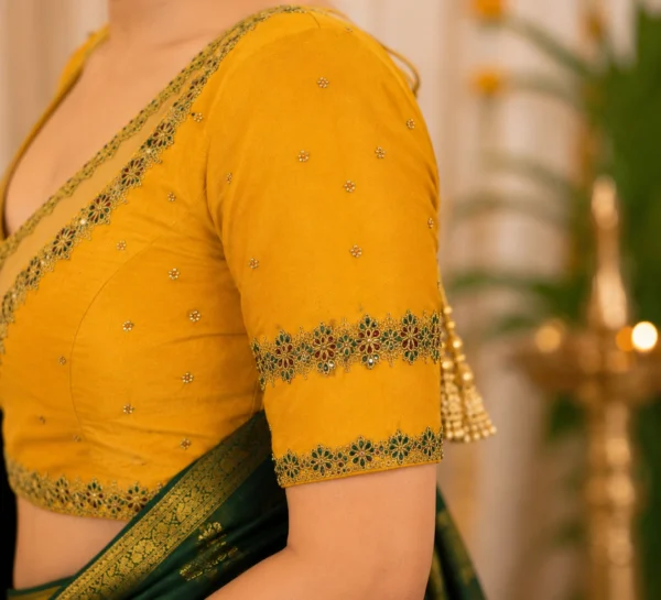 Bridal Aari Blouse Sleeve Design with Floral Maggam Work Border and Stone Embellishments