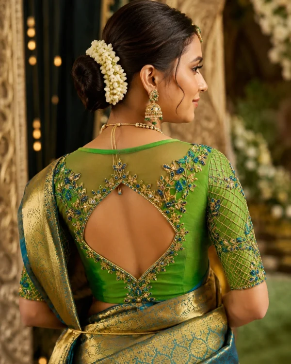 Designer bridal Aari blouse back neck design with handcrafted Maggam work and stone embroidery