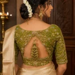 Deep back bridal Aari blouse with peacock tassel embroidery design