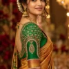 Emerald green Aari Blouse sleeve with paisley kundan and Maggam Work embroidery