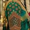 Emerald green Aari blouse sleeve with gold Maggam work, beads and geometric mirror embroidery