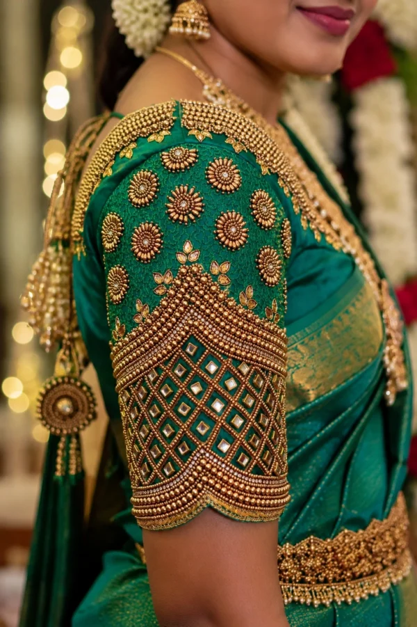 Emerald green Aari blouse sleeve with gold Maggam work, beads and geometric mirror embroidery
