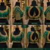 Emerald green Aari bridal blouse 360 degree view showing front, back and embellished sleeves