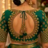Emerald green Aari bridal blouse back view with ornate gold embroidery and dori latkan