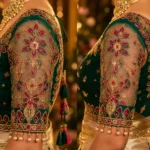Transparent Net Sleeve Bridal Aari Embroidery with Floral Maggam Work, Ruby Stones and Antique Gold Beads