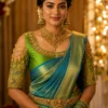Green Peacock Aari Bridal Blouse front view with floral embroidery and buff sleeves