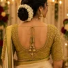 Olive gold Aari Bridal Blouse back view with embroidered U neck, Kundan work and bridal tassels