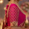 Pink bridal blouse sleeve with diamond lattice Aari embroidery and gold Maggam work