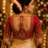 Back view of Royal Crimson Temple Couple Bridal Aari Blouse with deep U-neck, temple couple embroidery and premium Aari work