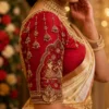 Royal Crimson Bridal Aari Blouse sleeve with dancing couple motif, temple arch embroidery and hanging jhumka Maggam Work