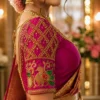 Royal magenta Aari blouse sleeve with gold diamond lattice and peacock Maggam embroidery