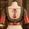 Gadwal-inspired silk blouse with heavy zari and floral Aari work