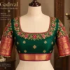 Gadwal-inspired silk blouse with heavy zari and floral Aari work