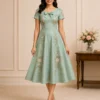 Rosalie Bow vintage bow party dress with fitted bodice and flared midi skirt